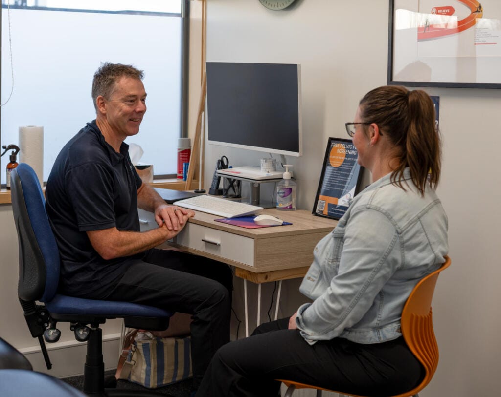 Doctor consulting with patient in medical office